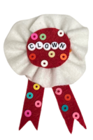 a colorful beaded ribbon reading clown