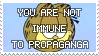 text reading 'you are not immune to propaganda' over garfield the cats face'